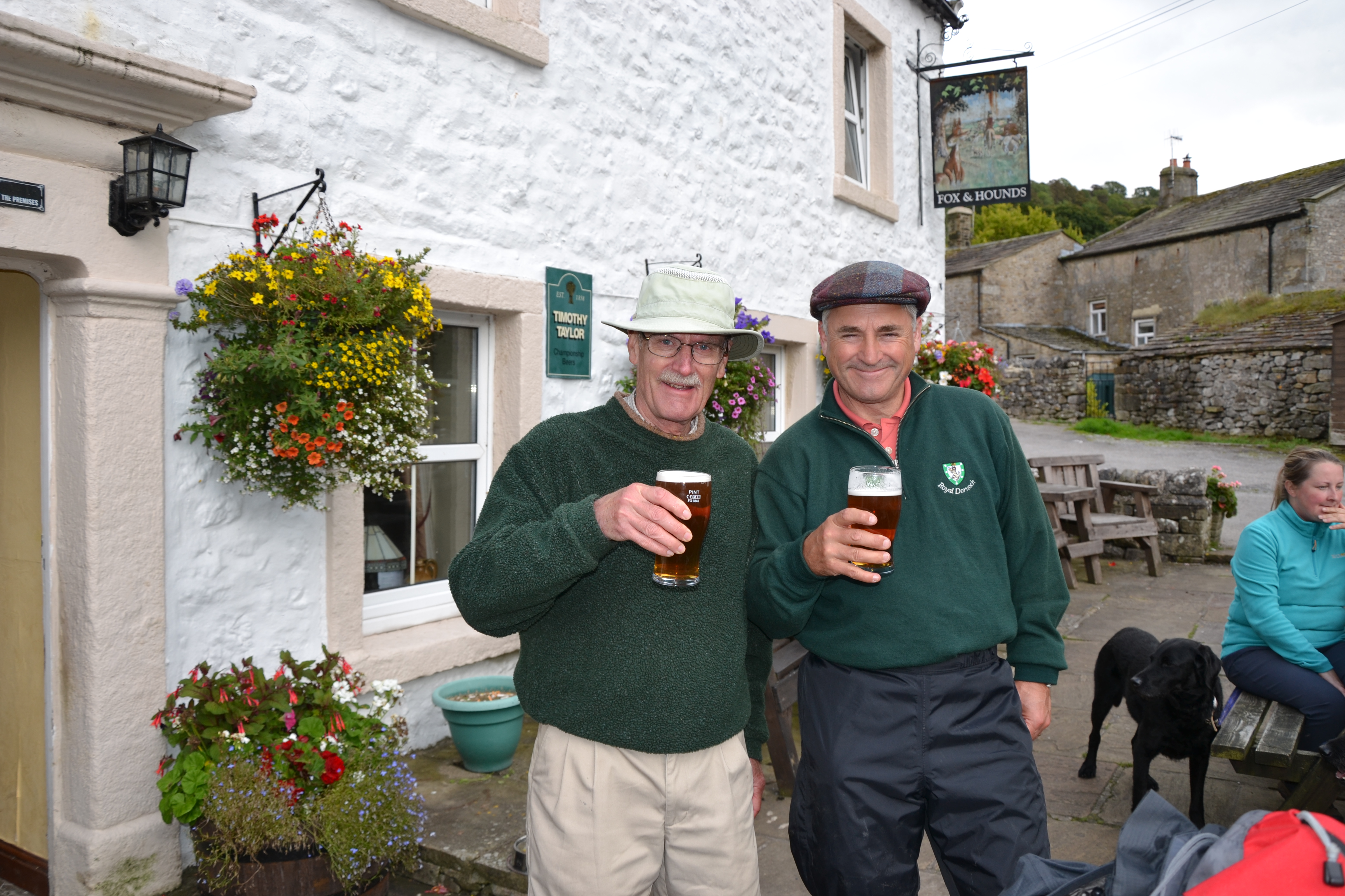 2 Gentlemen enjoying a pint at the Fox and Houds pub
